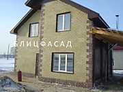 Дом обшит плиткой "Силикатный кирпич"
