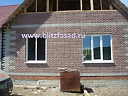 Дом обшит Вилкой Ростовский камень цвет коричневый